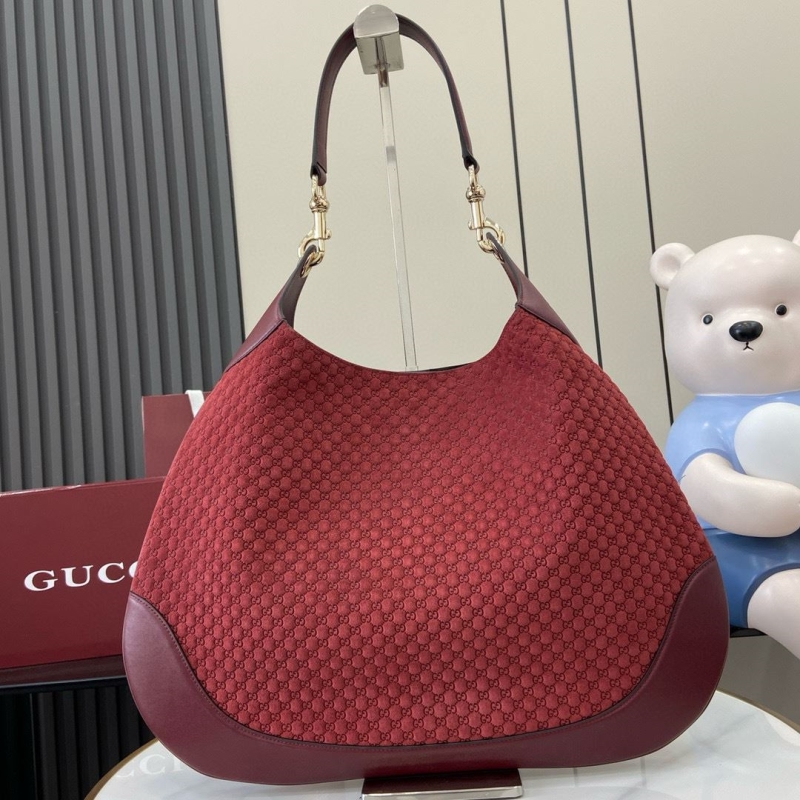 G*u*i top handle bags
